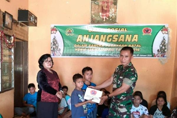 Berbagi Kasih Natal, Prajurit Yonif 123/Rajawali Anjangsana ke Panti Asuhan