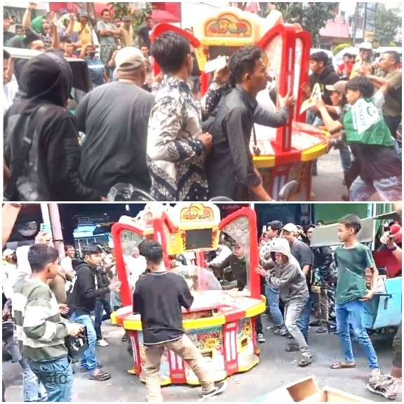 Massa Ansor Hancurkan Tempat Dan Alat Permainan Tembak Ikan