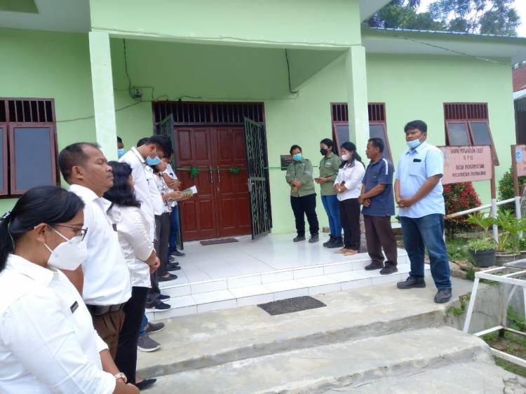 PT. TPL Bangun Kantor Kepala Desa Pangombusan