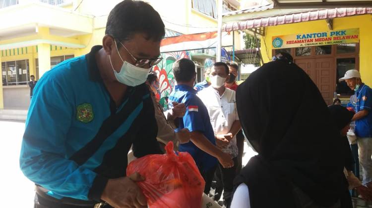 Bakti Sosial dan Pembagian Bagai Anak Yaim dan Nelayan