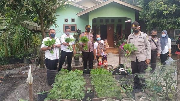 Kapolsek Perdagangan Tinjau Kampung Tangguh di Pematang Kerasaan