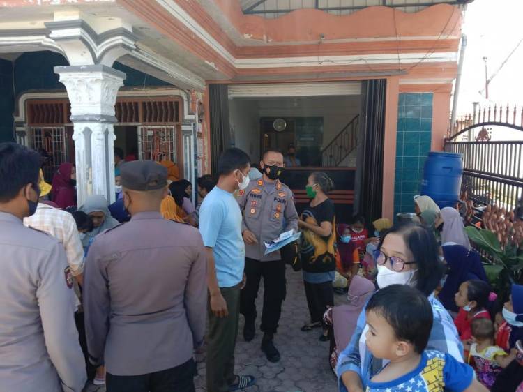 Kapolsek Bangun Pastikan Masyarakat Penerima BST Mau Divaksin