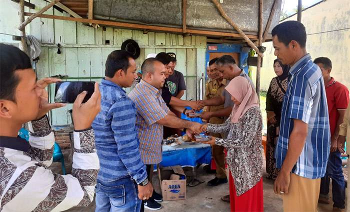 Peduli Keluarga Korban Kebarakan di Paluta, DPW Parpaluta Serahkan Donasi Rp 38 Juta