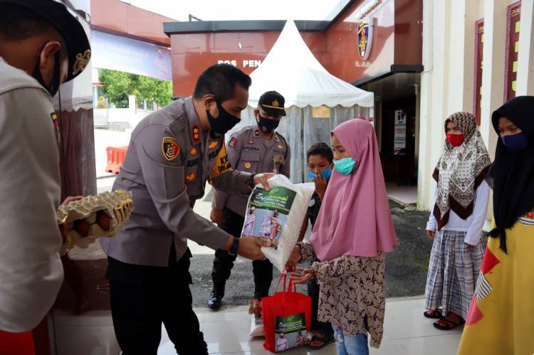 Safari Ramadhan, Kapolres Taput Berbagi Keberkahan dengan Santuni Anak Yatim dan Renovasi Masjid