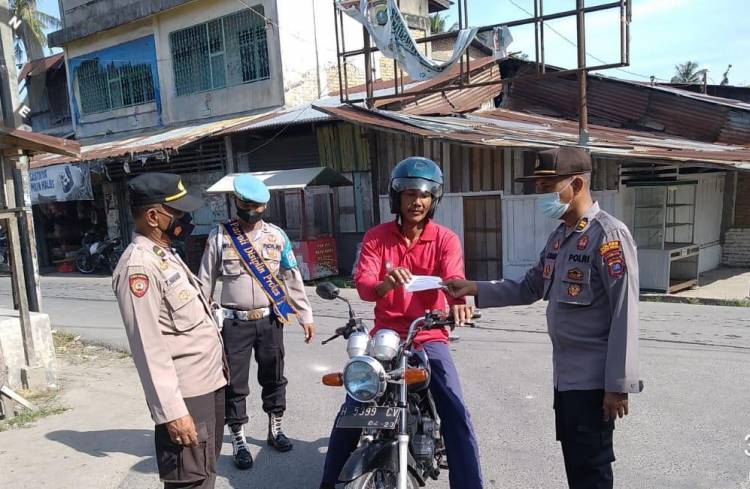 Polsek Pantai Cermin Himbau Masyarakat Patuhi Prokes