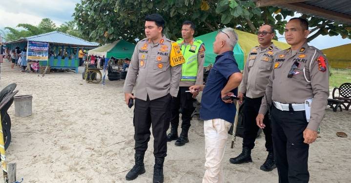 Polres Toba Amankan Wisata Pantai Pasir Putih Parparean