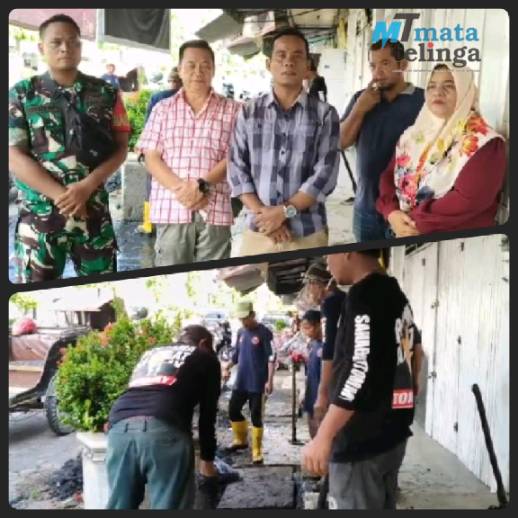 Tommy, Anggota DPRD Labuhanbatu Fasilitasi Pembersihan Drainase Didepan Toko Jalan Sudirman Rantauprapat