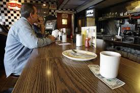 Warga Amerika Mengurangi Pengeluaran, Bersiap Menghadapi Tarif Baru