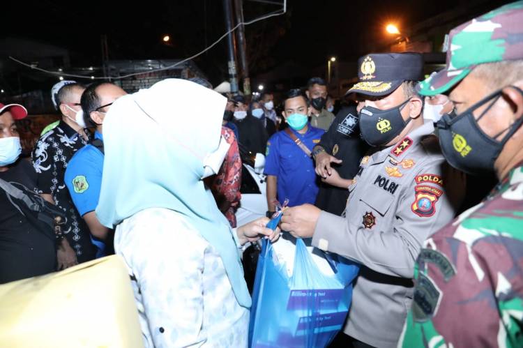 Warga Terpapar Covid-19 di Kota Medan Dapat Bantuan alat Swab Antigen dari Kapoldasu