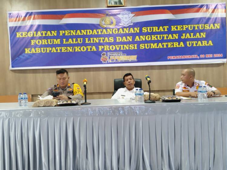 Kapolres dan Bupati Simalungun Mengikuti Kegiatan Penandatanganan Draf SK FLLAJ Secara Serentak