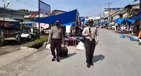 Polsek Pantai Cermin Himbau Masyarakat Patuhi Protokol Kesehatan