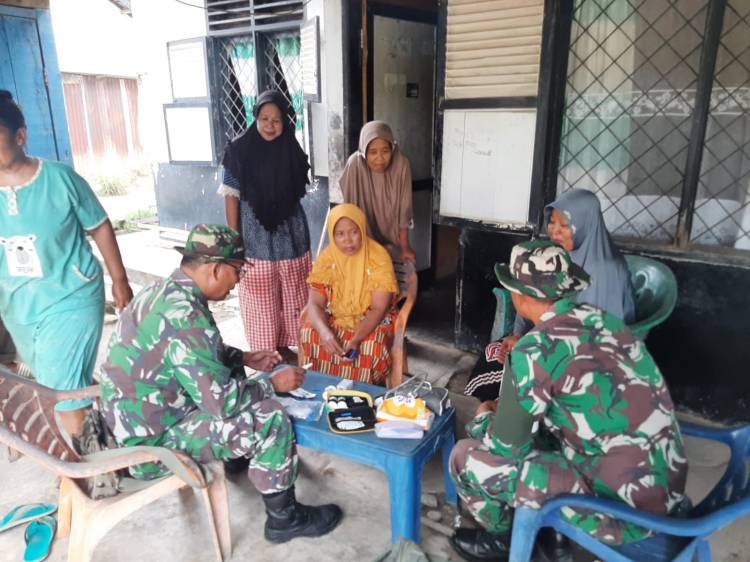 Satgaskes TMMD Kodim Deliserdang Door to Door Layani Kesehatan Masyarakat