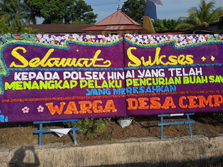 Mako Polsek Hinai Banjir Papan Bunga Pasca  Tangkap  Maling  Sawit Warga