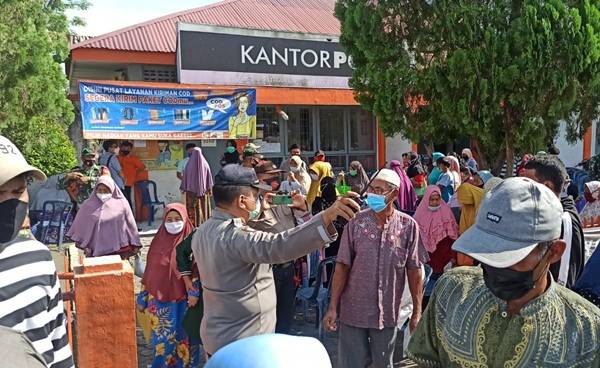 Timbulkan Kerumunan, Penyaluran BST di Batang Kuis Dibubarkan Satgas Covid 19