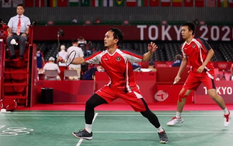 Olimpiade Tokyo 2020 : Tundukkan Tuan Rumah, Ahsan/Hendra Melaju ke Semifinal Bulu Tangkis