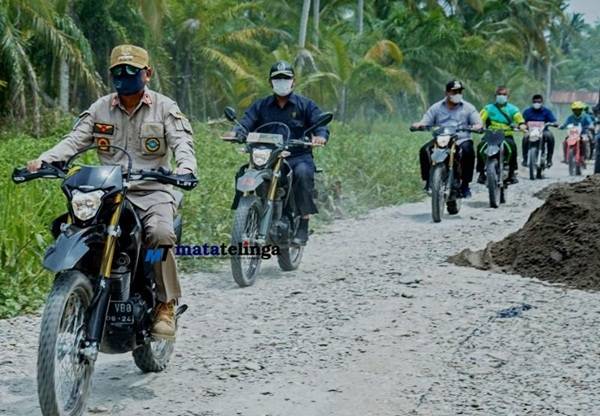 Bupati dan Wabup Asahan Ngetrail Tinjau Jalan Karya Bhakti TNI AD