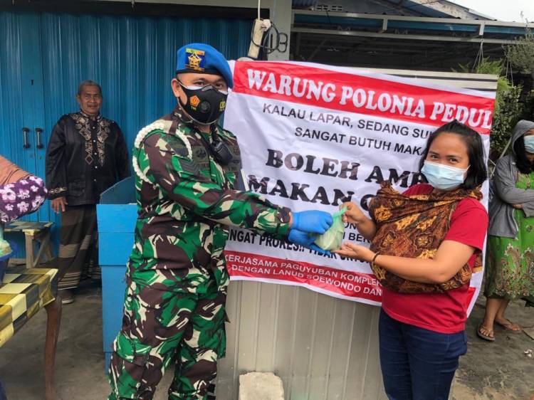 Pandemi Covid-19, Satpomau Lanud Soewondo Terjun Bantu Meringankan Beban Masyarakat