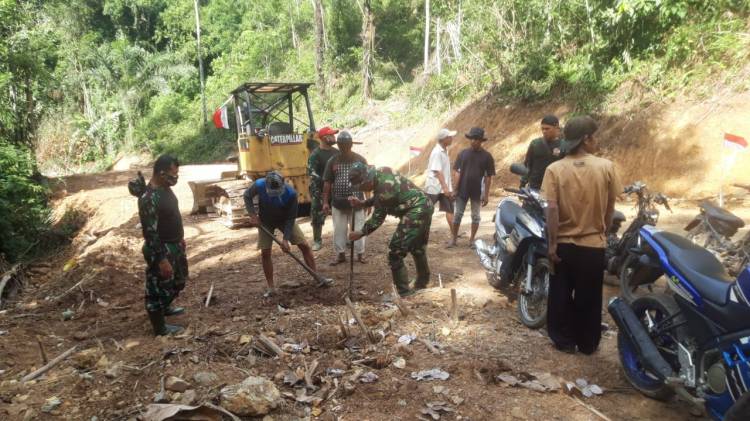 Anggota Satgas TMMD Lanjutkan Goro Massal