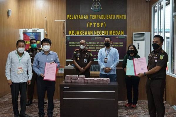 Adelin Lis Serahkan Uang Pengganti Kerugian Negara Rp 1 Miliar dan Sertifikat Bangunan