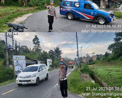 Personil Polsek Parapat Atur Arus Lalu Lintas di Wilayah DPSP Danau Toba Parapat