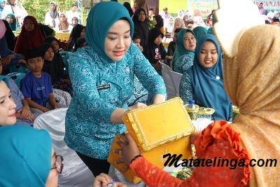 Pj. Ketua TP PKK Langkat Serahkan 100 Paket Sembako Bantuan Presiden RI di Kecamatan Tanjung Pura