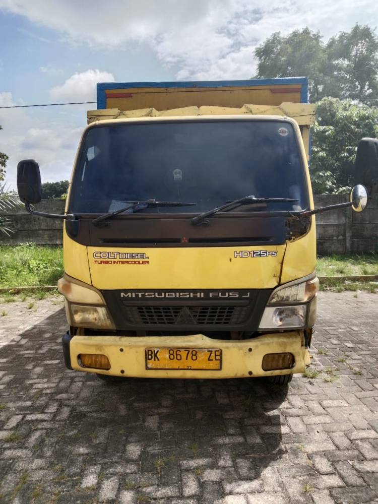 Pemotor Tewas Dilindas Truk di Patumbak