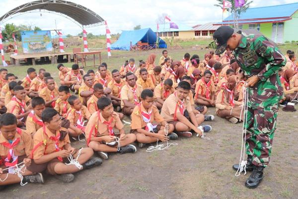 Peringati Hari Pramuka ke-58, Prajurit Pamtas RI-PNG Berikan Materi Bela Negara