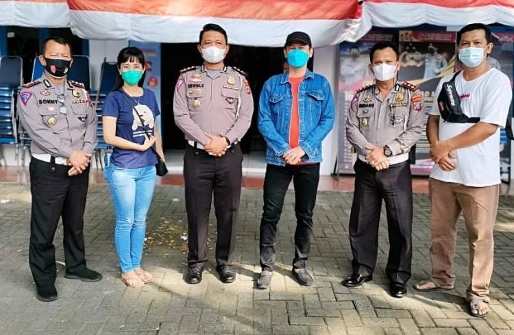 Dragon Reborn Community Medan  Berbagi Kepada Personil Lantas Polrestabes