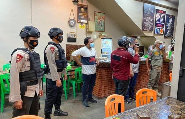PPKM Level 4 Diberlakukan di Kota Pematangsiantar, Brimob Poldasu Laksanakan Ops Yustisi