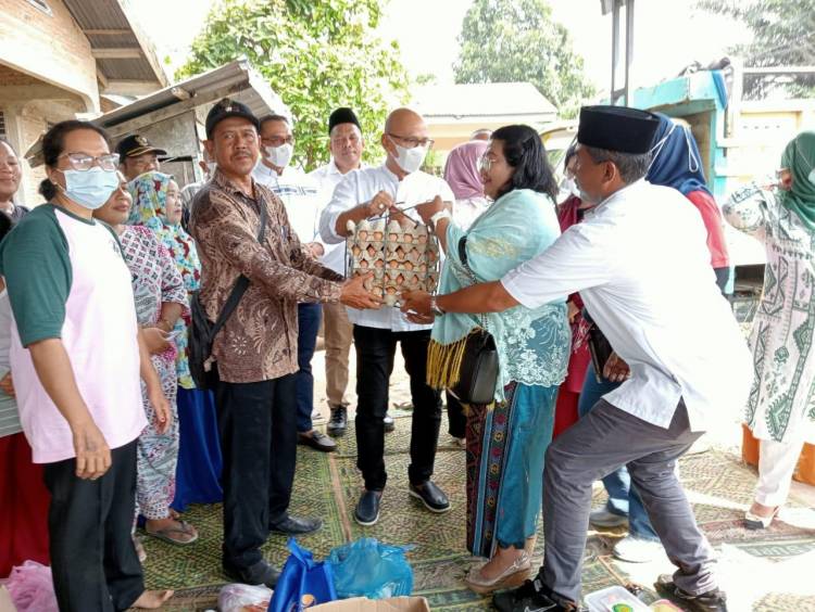 Banjir Surut PTPN II Berikan Bantuan Sembako