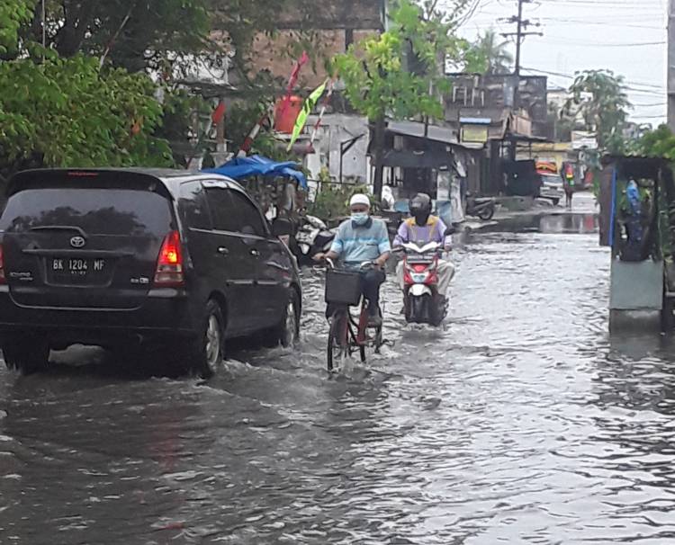 Sergai Dikepung Banjir