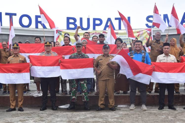 Kapolres bersama Badan Kesatuan Bangsa Simalungun Sambut HUT RI ke-78 Dengan Gerakan Pembagian 10 Juta Bendera Merah Putih