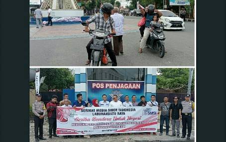 SMSI Labuhanbatu Raya Bagikan 1000 Bendera Merah Putih Kepada Pengendara Di Simpang Enam Kota Rantauprapat