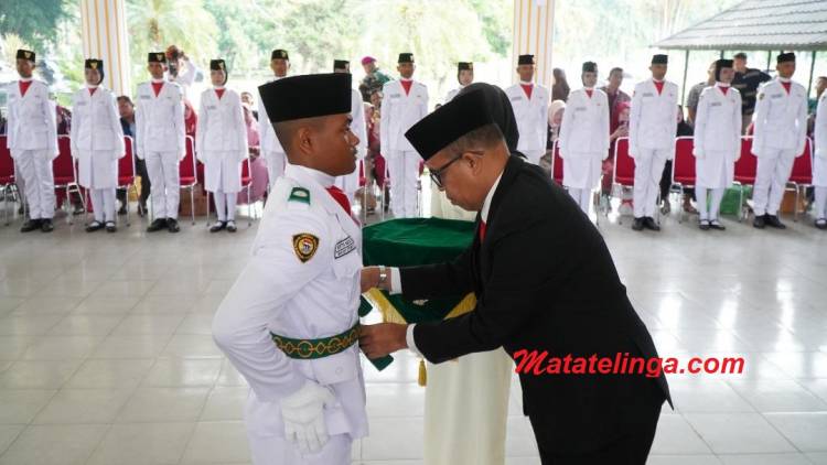 Pj. Bupati Langkat Faisal Hasrimy Mengukuhkan 58 Anggota Paskibraka