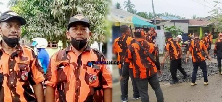 PAC Pemuda Pancasila Kecamatan Buntu Pane Bantu Perbaiki Jalan Rusak