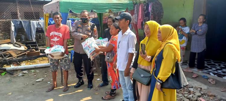 Polsek Medan Baru dan Bakti Musik Salurkan Bantuan Sembako