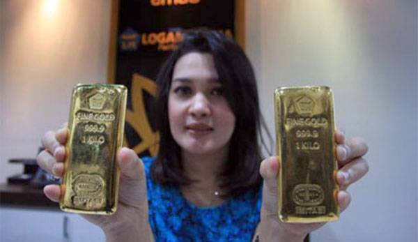 Harga Emas Spot Sedikit Berubah di Level US$1.886,69 Per Ons Troi