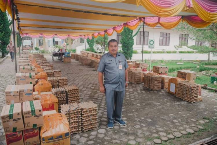 Pemkab Humbahas Salurkan Bansos ke Pelaku Usaha dan Penyandang Disabiltas
