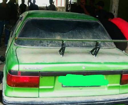 Gempar, Warga Temukan Mayat Perempuan Dalam Mobil Sedan Hijau