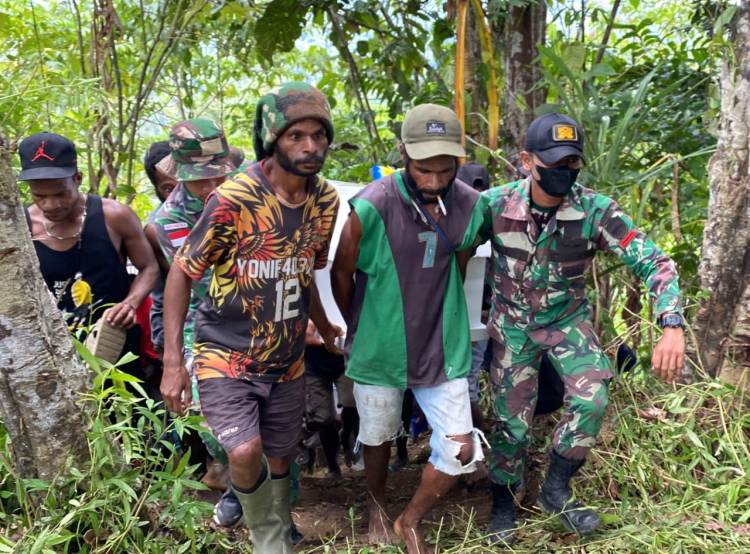 Satgas Yonif 126/KC Bantu Proses Pemakaman Warga Perbatasan