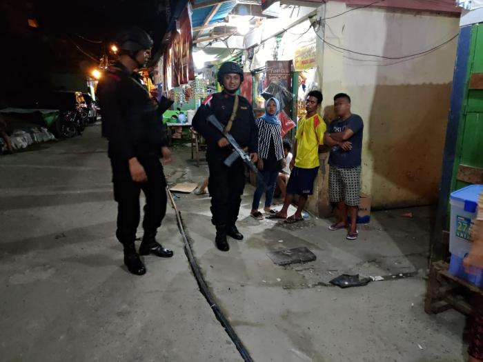 Ciptakan Rasa Aman di Jayapura Saat Malam Hari, Brimob Kaltim Laksanakan Patroli Jalan Kaki