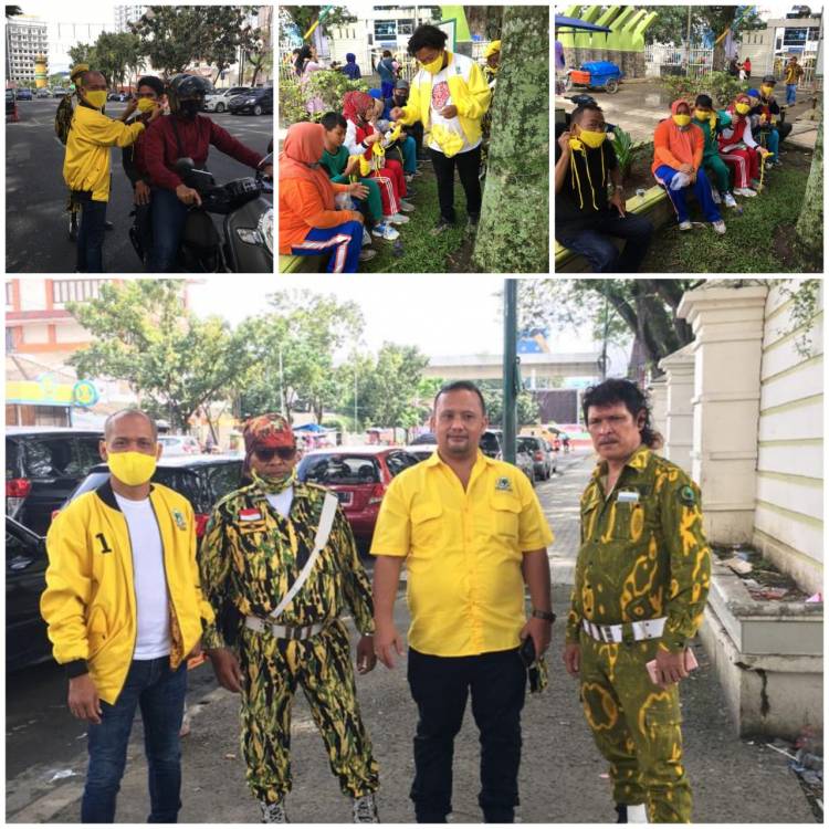AMPG & Golkar Medan Barat Bagikan Masker Di Lapangan Merdeka