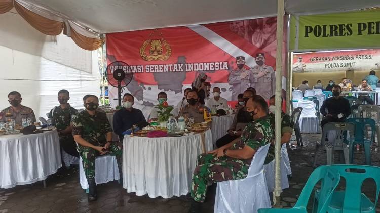 Vaksinasi Serentak Polda Sumut, Polres Pelabuhan Belawan Vaksin Warga Hamparan Perak