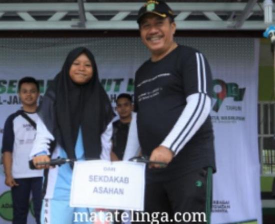 Semarakkan HUT ke 89 Al-Jam'iyatul Washliyah, Sekdakab Asahan Bagi-bagi Sepeda