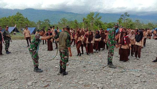  Satgas Yonif Raider Khusus 136/Tuah Sakti Dukung Gerakan Pramuka di Tehoru Maluku