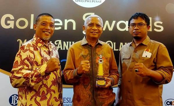 Bupati Asahan Terima Penghargaan Peduli Olahraga Siwo PWI