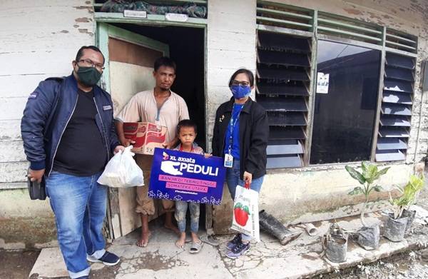 XL Axiata Bantu Korban Banjir Tebing Tinggi