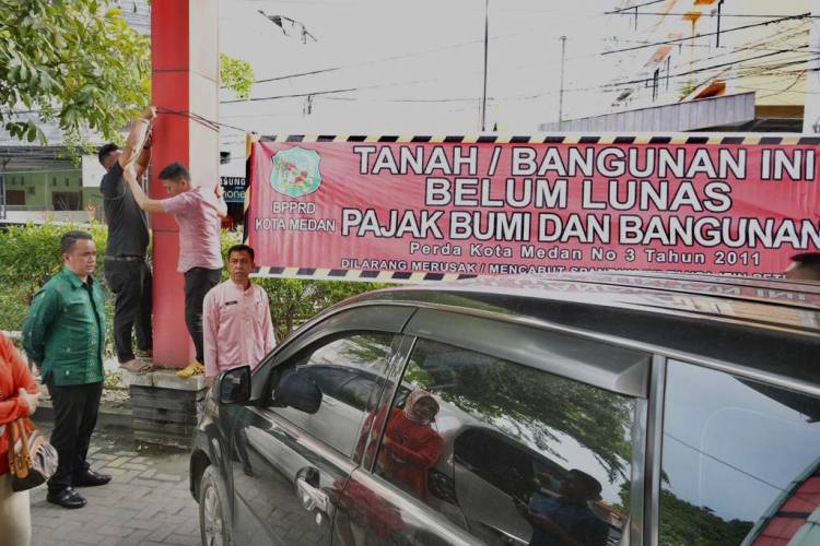 Kabarnya Hotel Grand Jamee Tunggak PBB, BPPRD Medan Pasang Spanduk dan Stiker Tunggakan