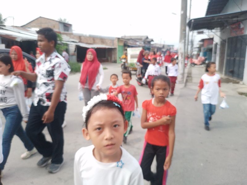 Semarak HUT RI, PAC PP Belawan Gelar Jalan Santai dan Giat Baksos