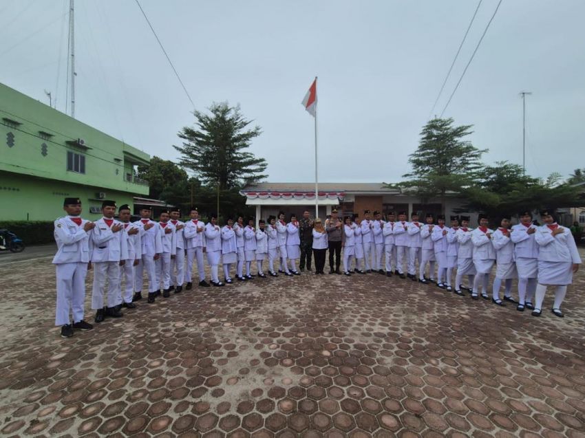 Polsek Bosar Maligas Sukses Pimpin Pengukuhan Paskibraka HUT RI ke-80,